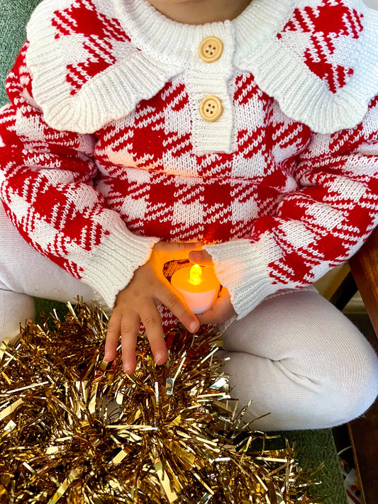 Houndstooth knit romper on baby